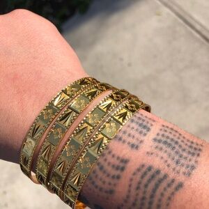 Intricate Gold Bracelet with Ornate Design